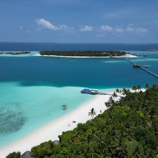 Aerial view of Conrad Maldives Rangali Island with bungalows